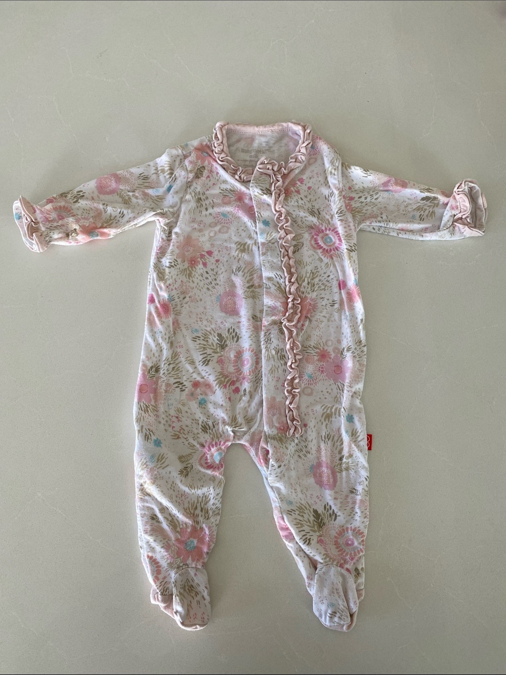 Magnetic Me Floral Ruffle One-Piece Romper in Pink